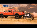 Bruder RAM 2500 Power Wagon with Scrambler Ducati Desert Sled Motorcycle and Driver